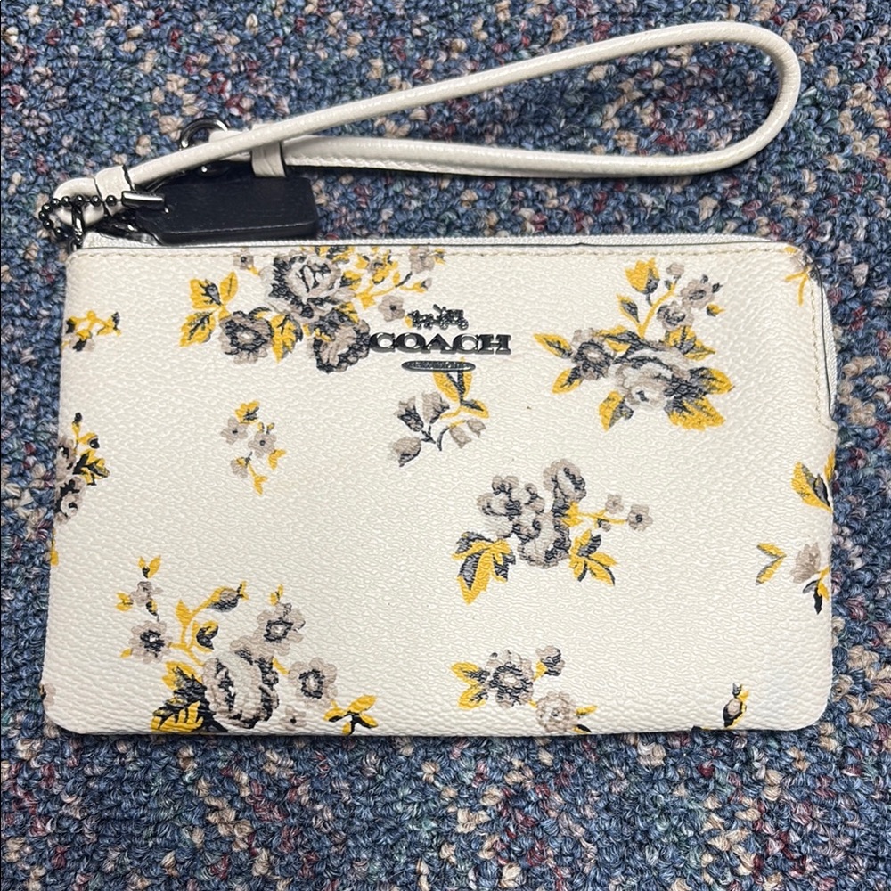 Coach Wristlet with prairie print, used one time, good condition